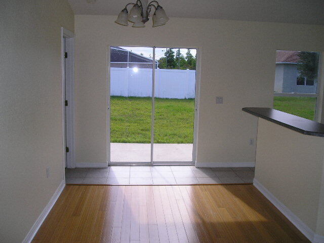 Building Photo - "Charming 3-Bedroom Haven with 2 Baths in Palm Coast – 1208 Sq Ft of Cozy Living!"