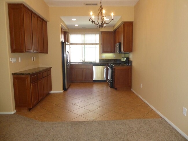 Building Photo - Conveniently located 3 BR, 3 Bath townhome in Coronado Ranch, close to everything.