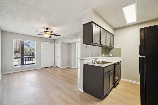 Welcome to The Riley Apartments, where modern design meets comfort. Enjoy spacious layouts, updated kitchens, and abundant natural light in a vibrant community. Don't miss your chance to call this home—schedule a tour today! - The Riley