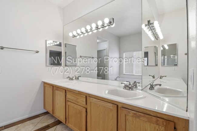 Building Photo - NW!! Single Story!!! 3 Car Garage!!  2 Masters!!! Low Maintenance desert landscape front yard!!  ...