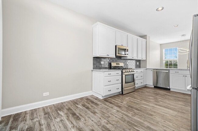 Building Photo - Modern 3-Bed, 2.5-Bath Townhome with Pond ...