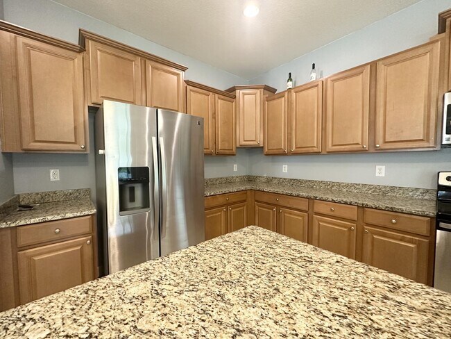 Building Photo - "Spacious 5-Bedroom Retreat with Scenic Views in The Verandahs!"