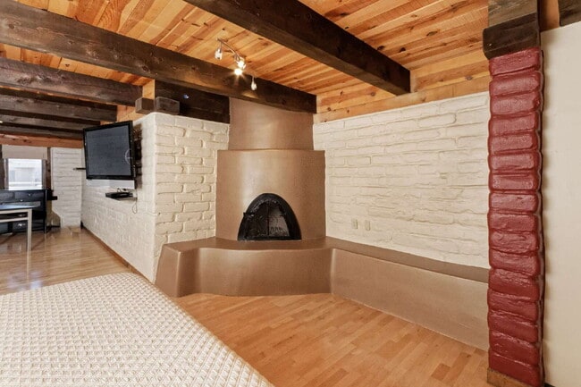 Building Photo - One-of-a-kind adobe brick home backing up ...