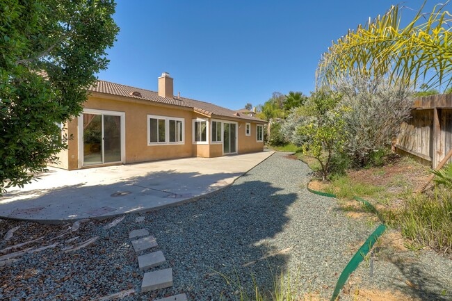 Building Photo - Charming 1-Story Corner Lot Home with Great Room & Patio