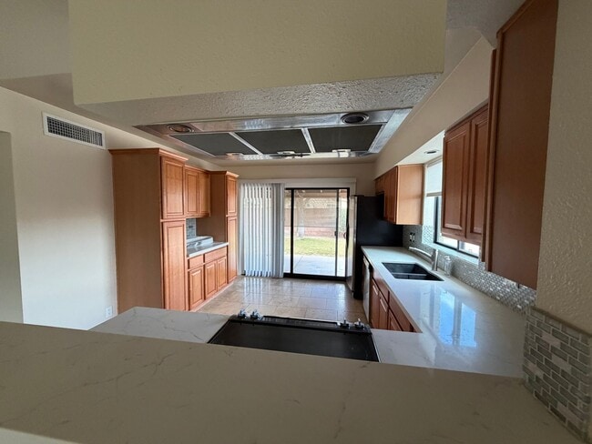 Building Photo - Beautiful 3bedroom/1.75 bathrooms, Corner Lot with RV Gate with Lush Backyard