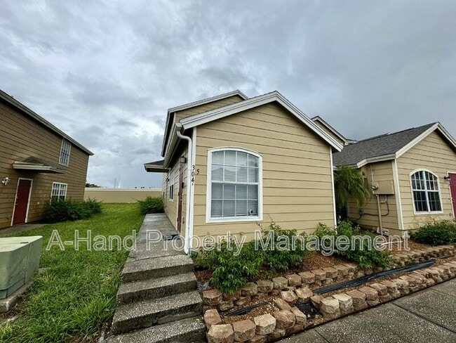 Building Photo - 304 Washington Palm Loop