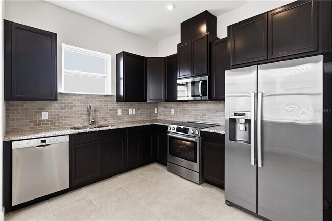 Building Photo - 13030 Stoddart Ave