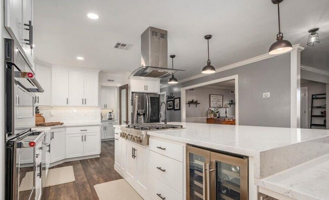 Building Photo - A Private Oasis with Unmatched Amenities 4 Bedroom 3 Bath