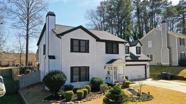 Building Photo - 4 bedroom house in Lawrenceville with cozy...