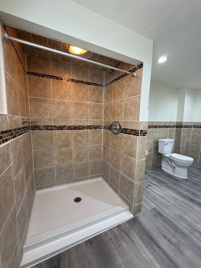 Building Photo - Updated 4BR / 2 Bath Home with off-street parking!