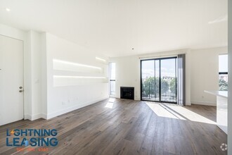 Building Photo - Sleek and Spacious Two-Bedroom with Breath...