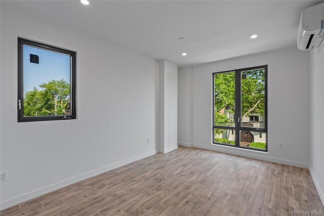 Building Photo - 213-41 38th Ave