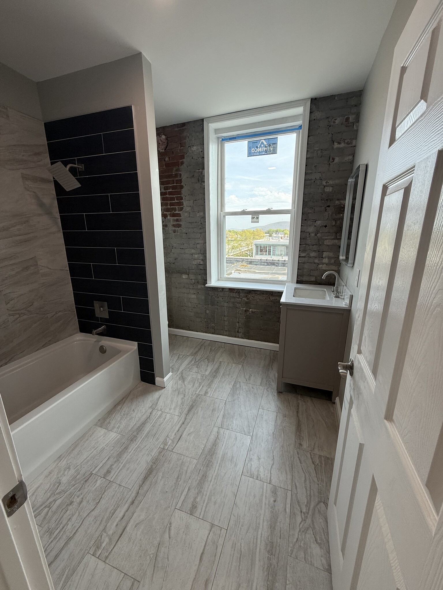 Hall bath - 111 N Main St