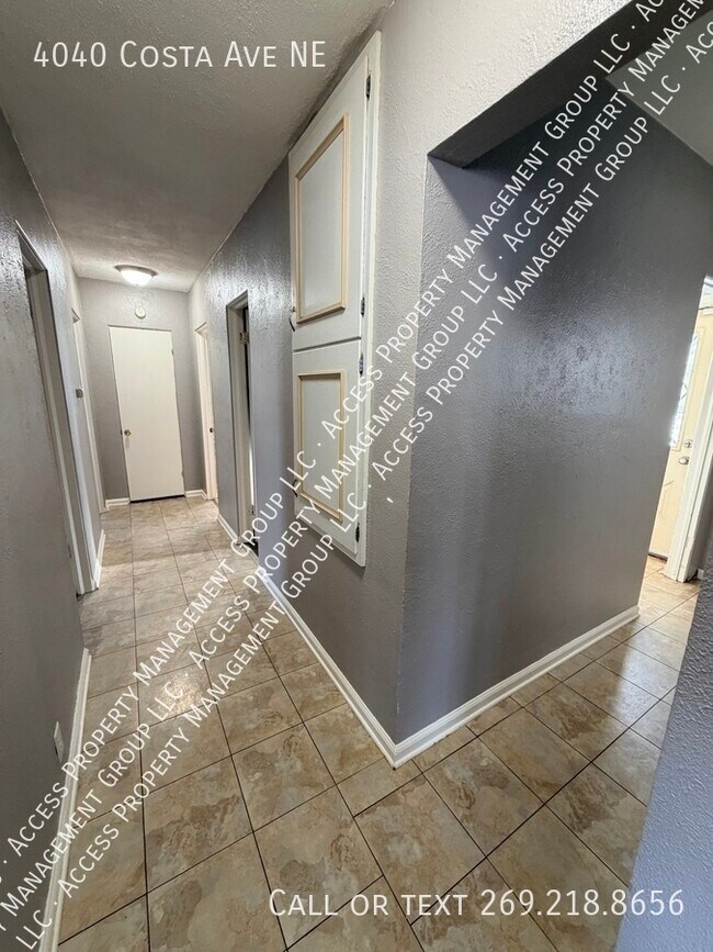 Building Photo - 4040 Costa Ave NE