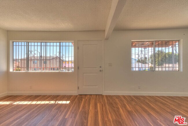 Building Photo - 8468 S Halldale Ave