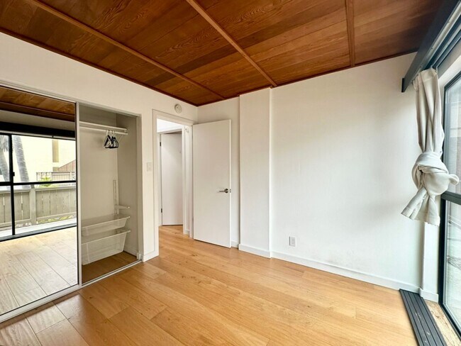 Building Photo - Modern 2BR/1.5BA Two-Level Condo w/ Patio ...