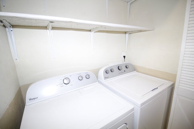 Building Photo - 2-Bedroom Waterfront Townhouse with Community Pool – Available 11/26