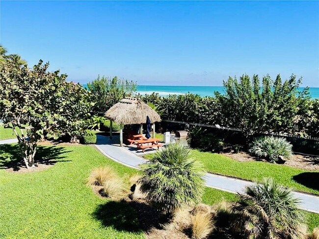 Building Photo - 6423 Collins Ave