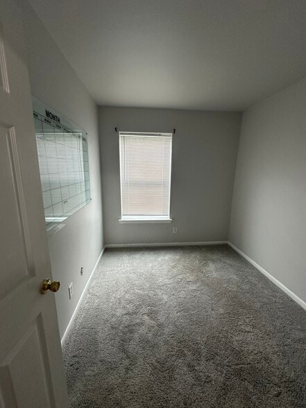 Bedroom 2 - previously used as an office, large acrylic calendar included - 221 Cornett St