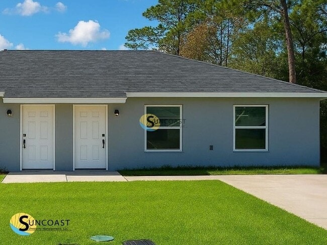 Building Photo - 9294 N Travis Dr