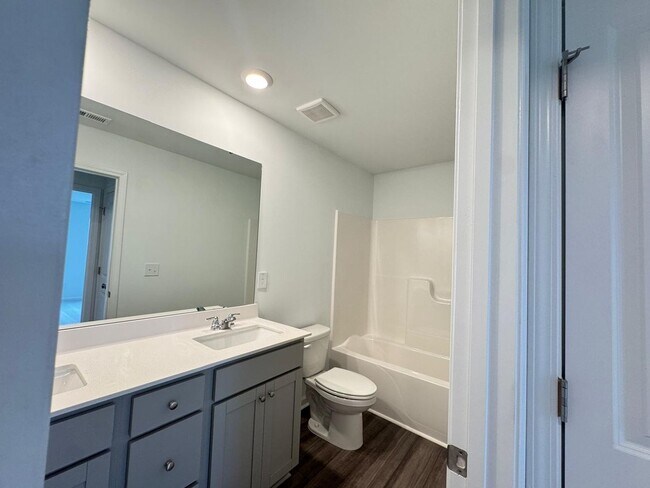 Building Photo - STUNNING BRAND-NEW TOWNHOUSE in a very con...