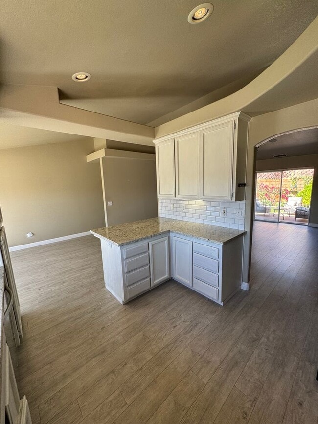 Building Photo - 4-Bedroom Home with Updated Kitchen and Co...