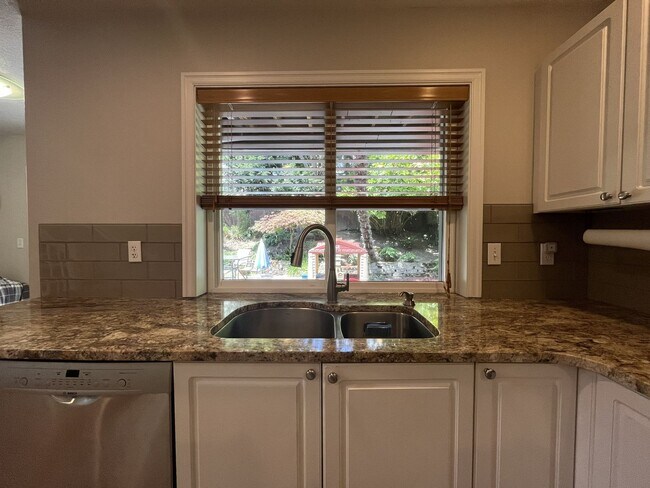 Building Photo - Spacious 3-Bedroom Home with Two Living Areas, Private Balcony, Fireplace & Attached 2-Car Garage