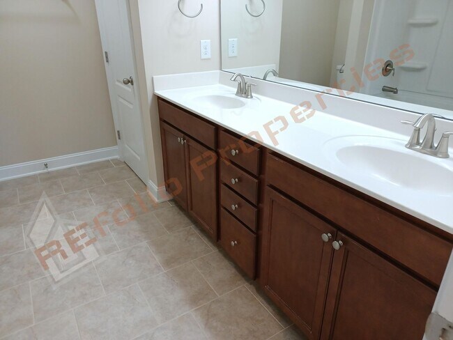 Building Photo - Luxury 5 Bedroom, 3 Bath, 2-Car Garage End Unit Townhouse w/1st level Primary Suite + Guest Suite...