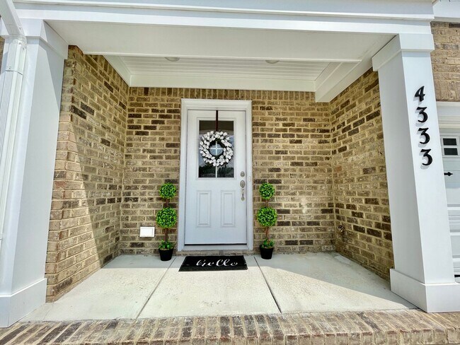 Building Photo - Practically New & Available NOW! Americana...