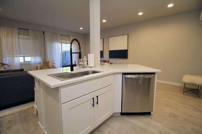 Building Photo - New Construction 3 Bedroom Townhome at Ple...