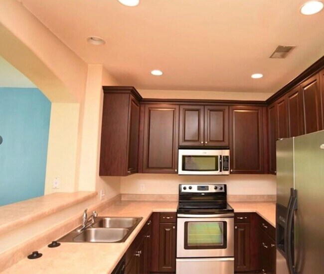 Building Photo - Townhome fresh paint and new carpet! Won't...