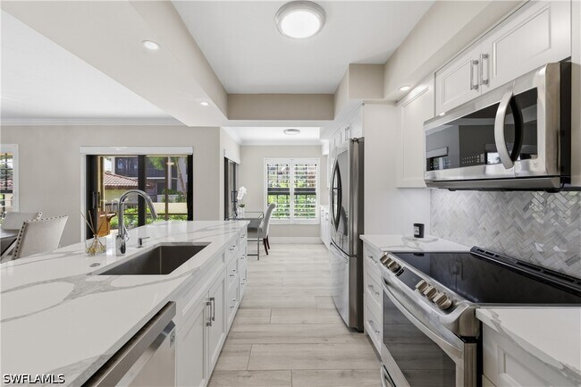 Building Photo - 6080 Pelican Bay Blvd