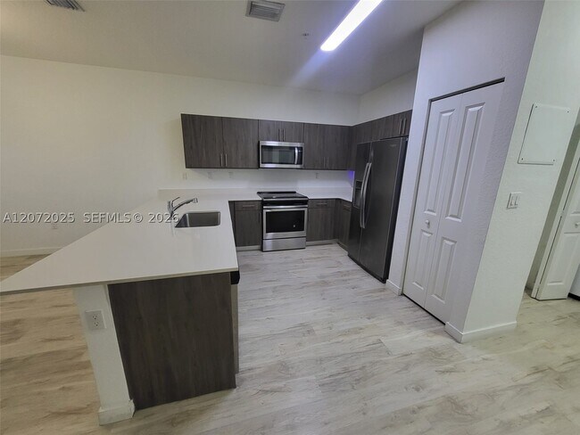 Building Photo - 15560 SW 136th St