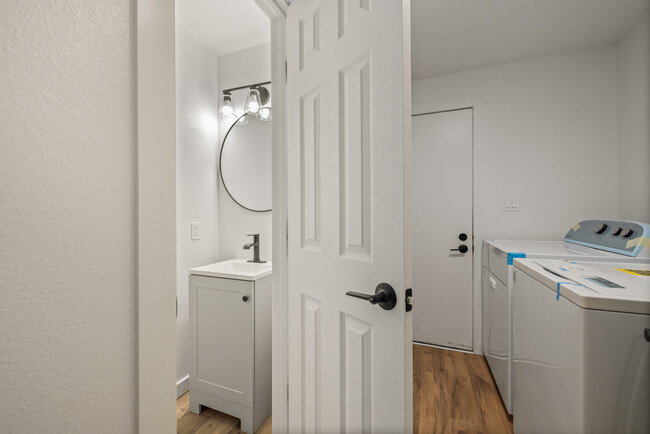 Powder bath & mudroom with washer and dryer - Rosedale Townhomes