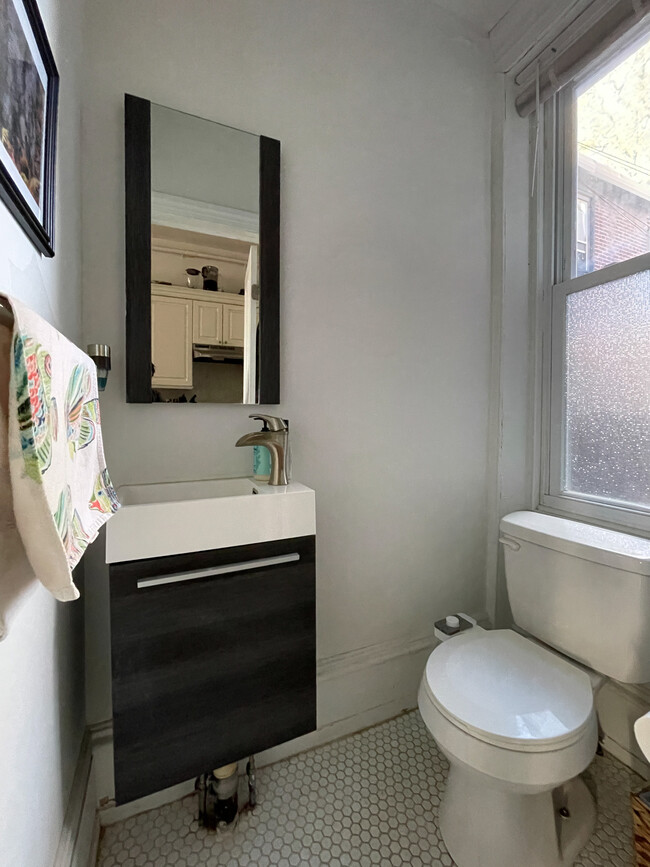 1st floor half bath - 988 N 5th St