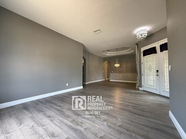 Building Photo - Executive Home with Custom Finishes in Gat...