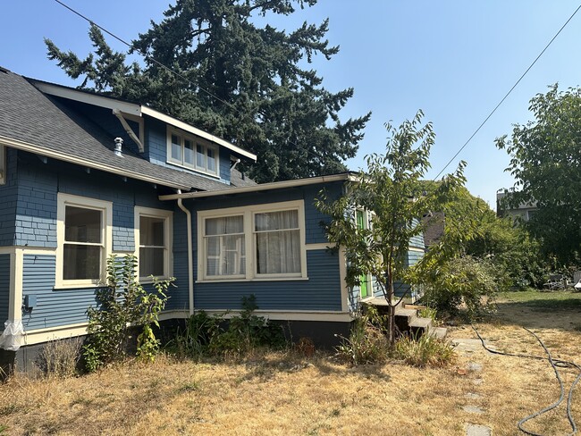 This is the sunny south side of a big Craftsman - 4806 SE 76th Ave