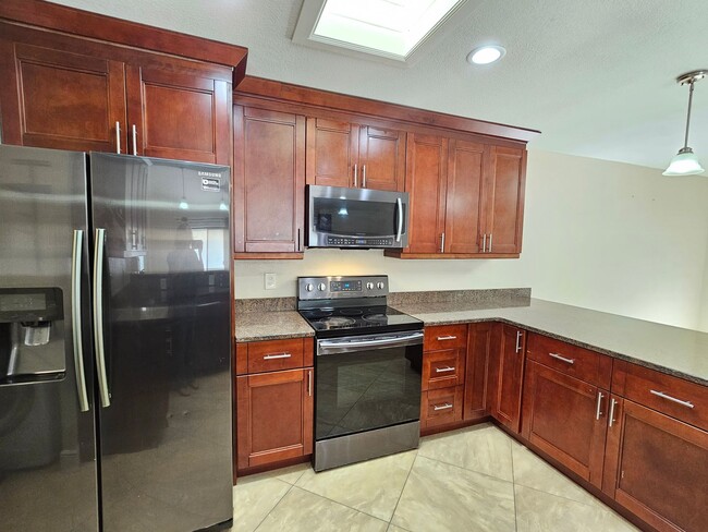 Building Photo - 3 bedroom 2 bath furnished & remodeled hom...