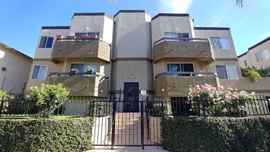 Building Photo - Village Beesan Condos