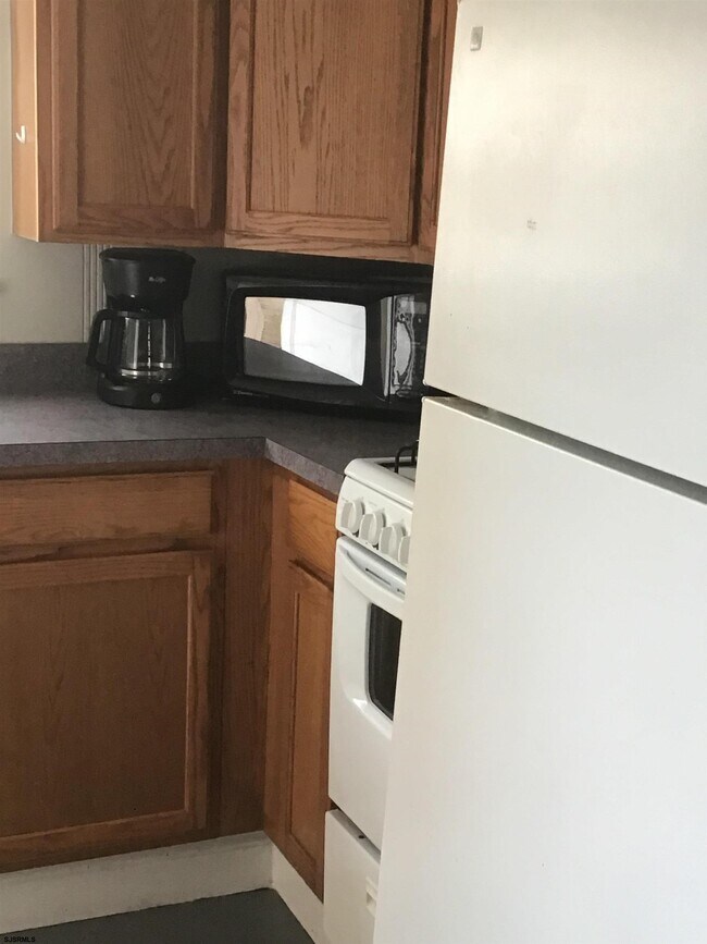 Building Photo - 9317 Monmouth Ave