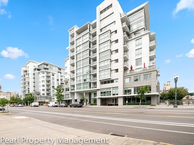Building Photo - Waterfront Pearl - 1 bed/1.5 bath/den sw corner unit with parking/2 balconies/river view/most uti...