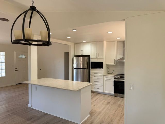 Building Photo - 15077 Adams Dr