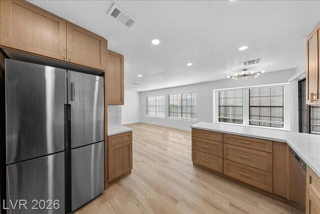 Building Photo - Beautifully 3 bedroom updated home located in the guard-gated Los Prados Golf Community!