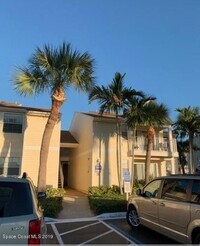 Building Photo - Beachside beauty! Updated 2nd floor unit in Beach Club!