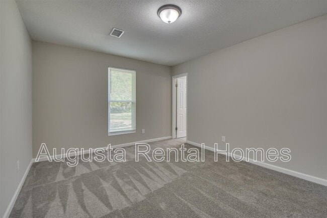 Building Photo - 2317 Woodsman Dr