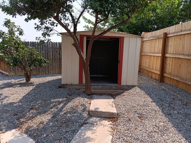 Building Photo - Spacious 4-bedroom, 2-bathroom home! Comin...