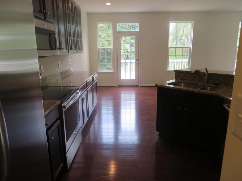 Kitchen and Eat in Area - 1280 Madison Ln