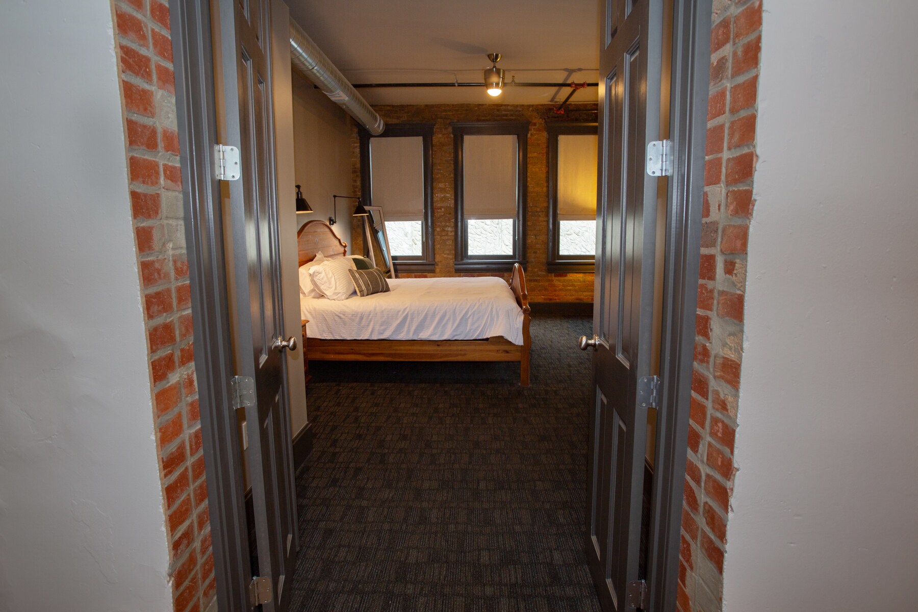 Bedroom #1 Custom Roman blinds hare blackouts. - 225 E Blaine Ln