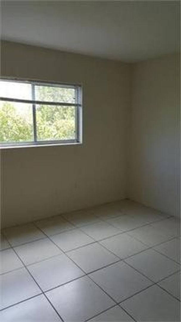 Building Photo - Newport Condominiums - 201