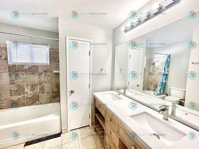 Building Photo - 2-bed, 2-bath, 2-story townhome with pool and park like setting outside the front door.